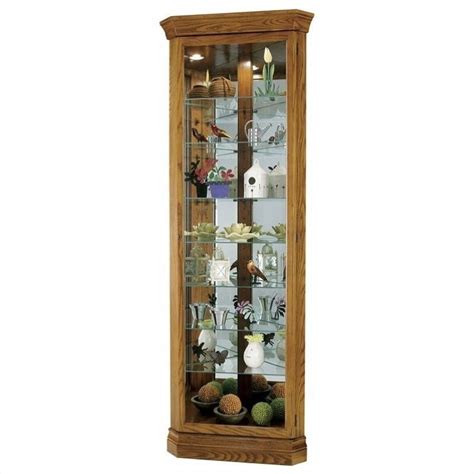 Amish ashley corner curio cabinet brighten a corner with a custom made curio. Legacy Oak Dominic Corner Curio Cabinet - 680485