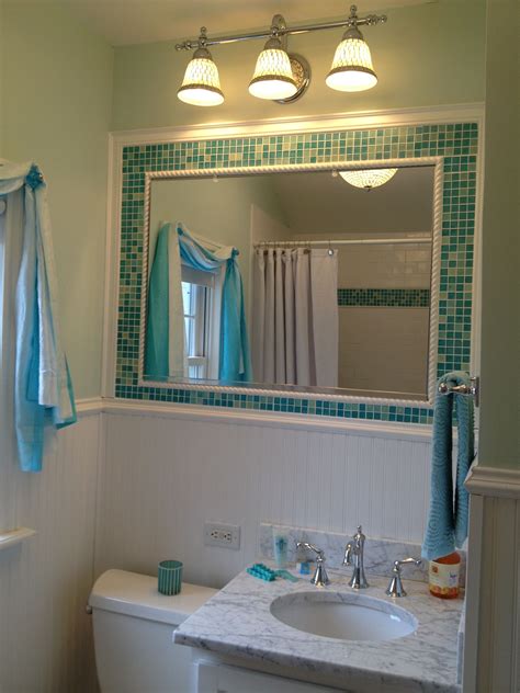 Diy mirror frame with glass mosaic tile armchair builder blog build renovate repair your own home save money as an owner Bathroom Mirror and Frame My Husband made with different ...