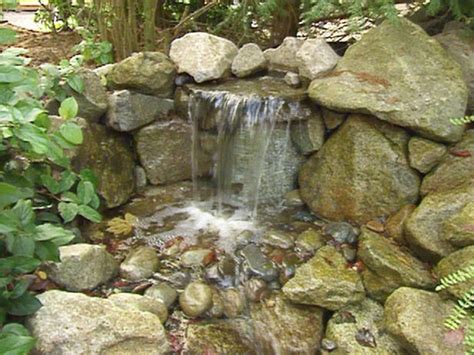 One of the easiest (and coolest) diy pondless water feature yet. DIY pondless waterfall mrscassanova | Gardening - DIY water fall | Pi…