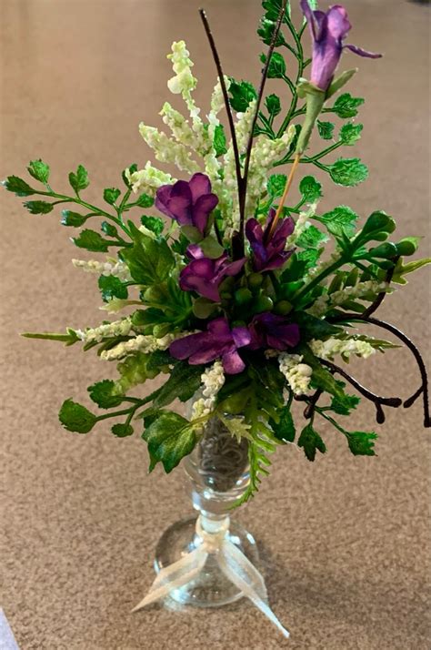 Mini Wine Glass Floral Arrangement In 2020 Floral Arrangements Glass Floral