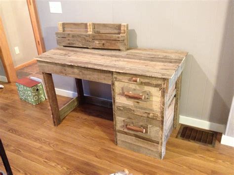 A Wooden Desk With Two Drawers On Top Of It In The Corner Of A Room