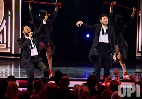 photo john legend and sebastián yatra perform at the latin grammy awards in las vegas