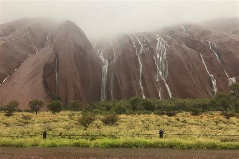 Ayers Rock Waterfall Shock Rare Downpour Transforms Face Of Uluru Daily Star