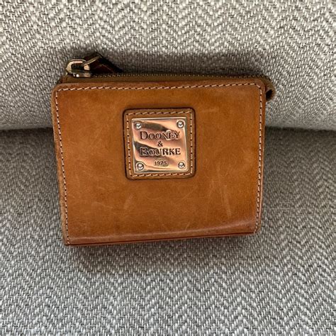 Dooney And Bourke Bags Dooney And Bourke Tan Leather Coin Purse
