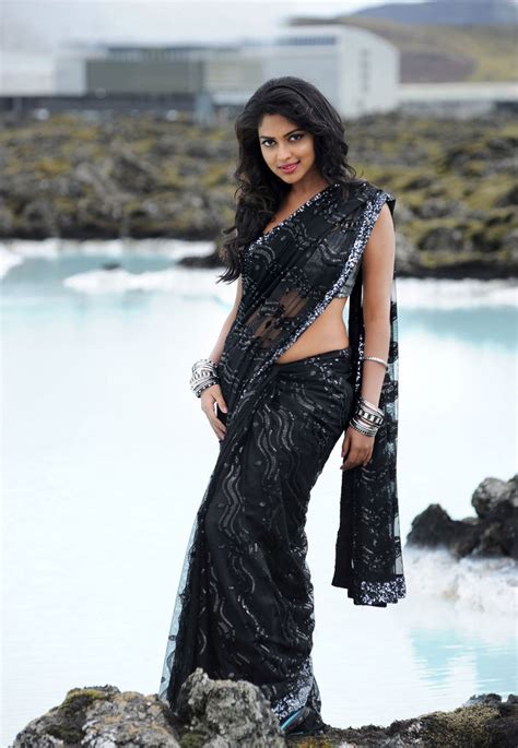 Amala Paul Latest Spciy Photo Gallery In Saree From Nayak Telugu Movie