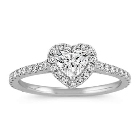 A charming heart shaped diamond ring with shoulder stones in white gold. Heart-Shaped Diamond Halo Engagement Ring | Shane Co.