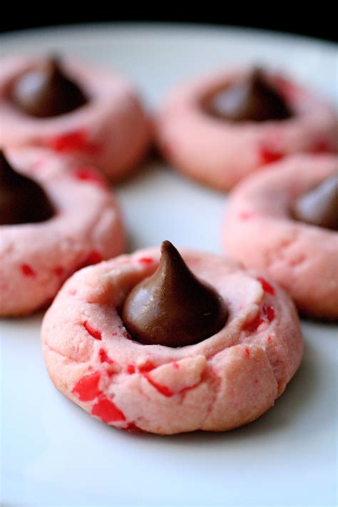 Thumbprint cookies are always a hit come christmastime, and these dreamy, melt in your mouth peanut butter cookies with a kiss inside are no exception. Scentsational: Cherry Chocolate Kisses cookies and ...