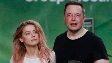 Amber Heard And Elon Musk Cuddle Up During First Public Outing