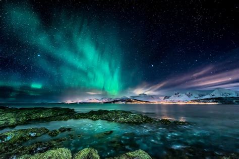 The northern lights are visible in a belt around the magnetic north pole. Northern Lights in Norway & Lapland - 6 Days | kimkim