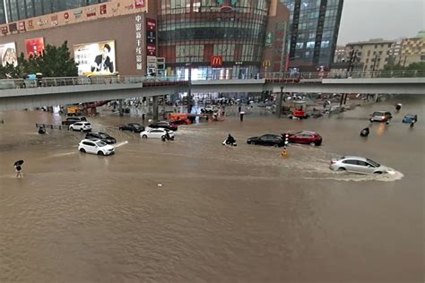 Severe Flooding In Central China Kills At Least 12 Traps Subway Riders In Waist High Water
