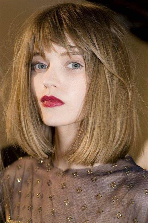 Medium length hairstyles for women completed with bangs are a perfect fit for the ladies who want to conceal a big forehead. Shoulder length bob | Medium length hair styles, Hair ...