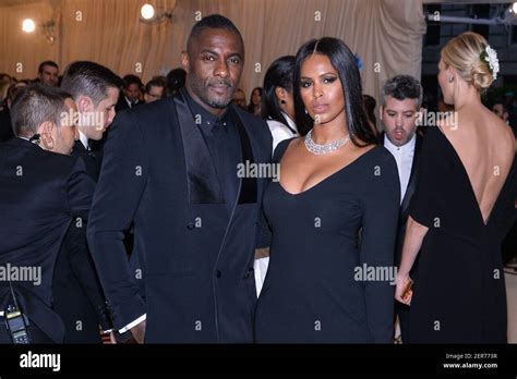Idris Elba And Sabrina Dhowre Walking On The Red Carpet At The