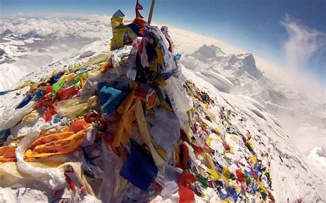 The Summit Of Mount Everest Littered With Flags From Climbers Pics