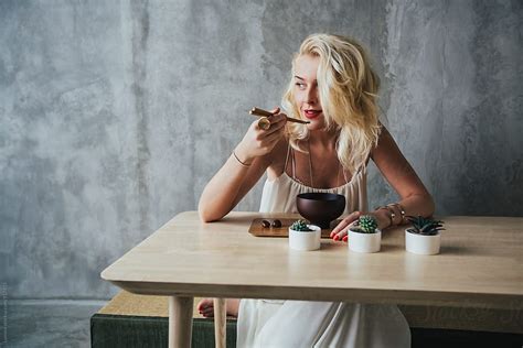 Woman Eating Ice Cream By Stocksy Contributor Lumina Stocksy