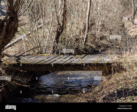 Timber Bridge Over Creek Stock Photo Alamy