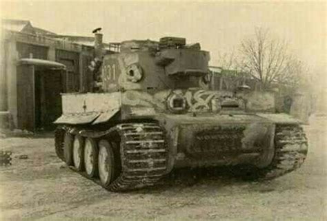 An Old Black And White Photo Of A Tank