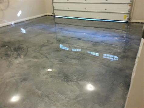 Our epoxy garage floor coatings get wow! reactions. Metallic Epoxy Overlay in Garage | Concrete floors, Garage ...