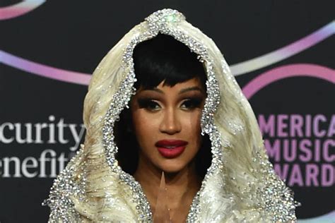 All Of Cardi Bs Bold Outfits From The 2021 American Music Awards