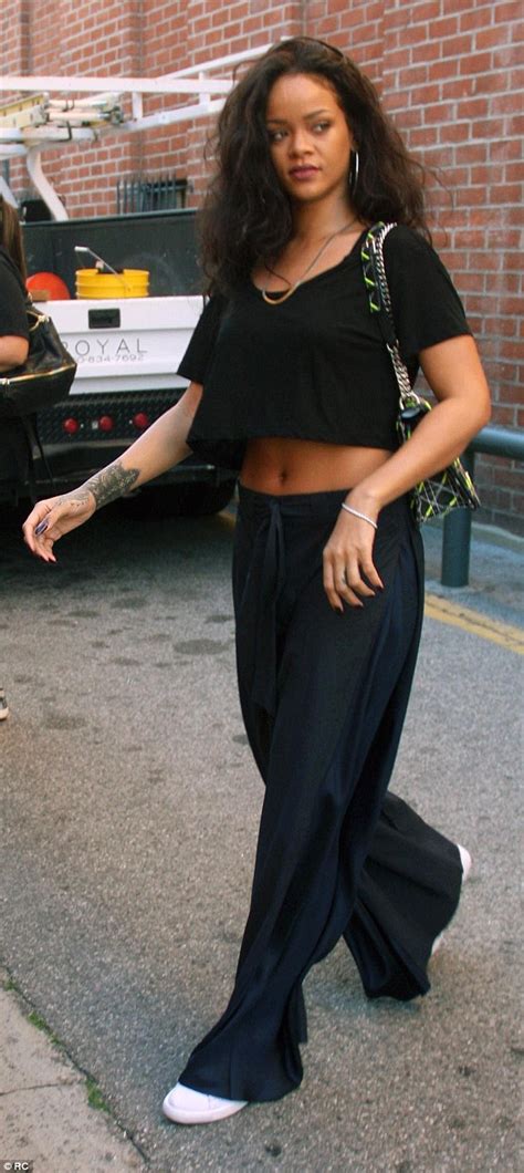 Rihanna Shows Off Her Abs As She Ditches The Couture For Casual Style