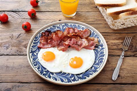 Fried Eggs And Bacon Stock Photo Image Of Restaurant 70320644