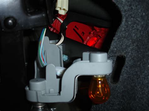 How to Replace a Tail Light Bulb on Toyota Auris - AxleAddict