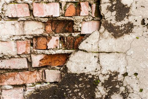 Crumbling Wall With Bricks And Plaster Stock Photos Motion Array