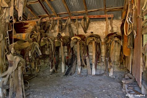 A barn is an outbuilding on a farm used to keep animals or crops safe and dry. Saddles in the Barn