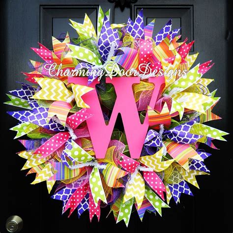 A Colorful Wreath With The Letter V On It