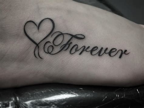 These heart designs look painted on, and one piece is cut out and placed on the other arm. 31+ Black Heart Tattoo | Tattoo Designs | Design Trends ...