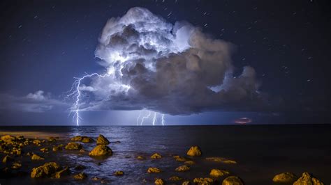 Wallpaper Storm Lightning Sea Stones 3840x2160 Uhd 4k Picture Image
