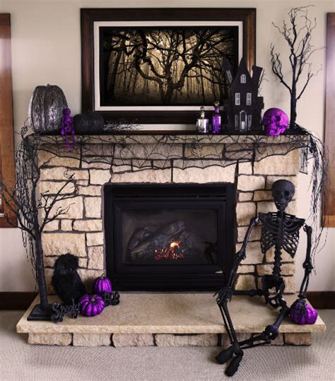 In case you are looking for other spooky but stylish halloween decorating ideas, check out this guide full of tips! 70 Great Halloween Mantel Decorating Ideas - DigsDigs