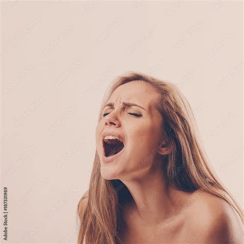 Portrait Of A Babe Woman During An Orgasm On A White Background Stock Photo Adobe Stock
