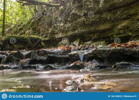 A Small Rapid River Flows Through Dolomite Rocks Long Term Exposure