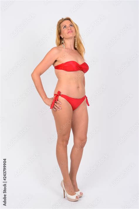 Full Body Shot Of Mature Woman In Bikini Ready For Vacation Stock Photo Adobe Stock