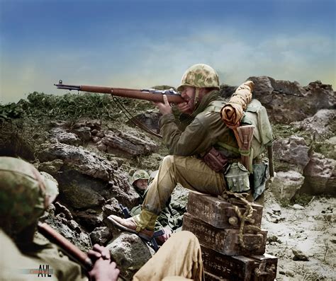 Us Marine Aiming His Rifle In Practice During A Lull In The Battle Of