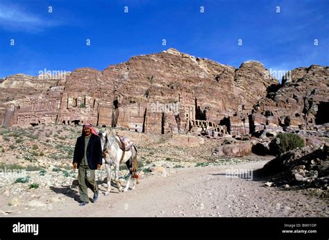 Petra Jordan Man Walking With His Horse Near The Entrance To The