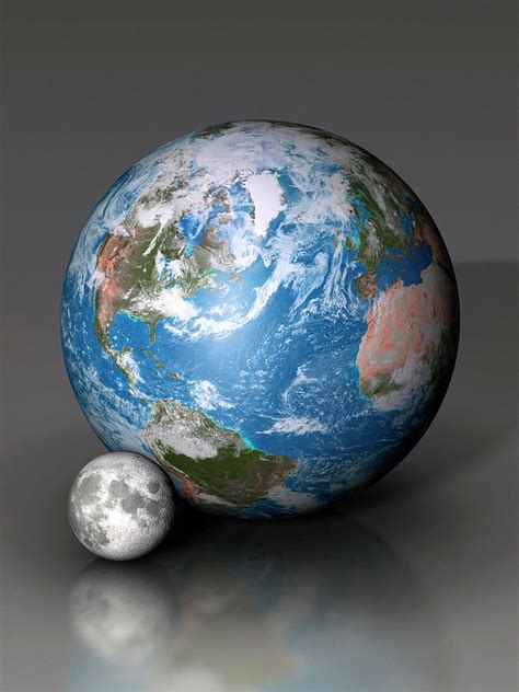 Earth And Moon Compared Photograph By Mark Garlick Science Photo Library Pixels
