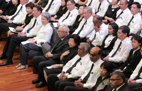 The body of singapore's former prime minister lee kuan yew is transferred from parliament house during a funeral procession in singapore. State Funeral Service