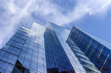 Glass Wall Of Business Center And Sky Reflection Hoodoo Wallpaper