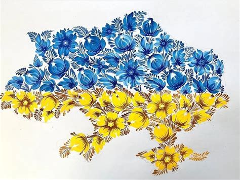 Blue And Yellow Flowers Are Arranged In The Shape Of A Map