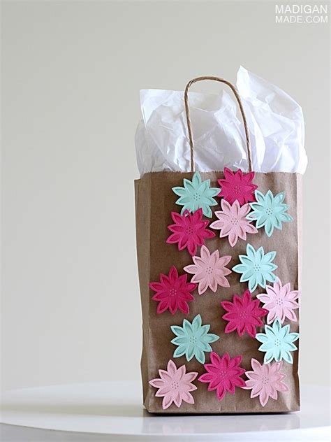 Before starting any project, practice piping on wax paper, a cutting board or any flat surface that can be wiped clean. DIY Gift Bag Craft Idea - Rosyscription
