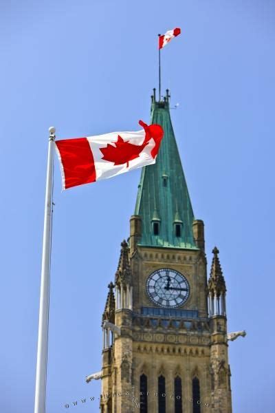 Canadian Flag And Peace Tower On Parliament Hill Ottawa Ontario