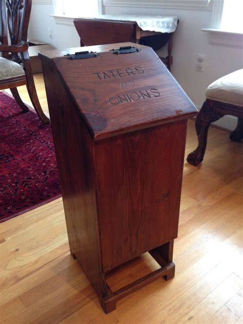 Hello folks you are viewing a potatoe and onion bin it stands 24 and 3/4 tall 15 wide and 11 deep the bin has a nice size drawer for your onons the letters are routered out so you can see them beter the bin is sanded and stained there is pegboard on back and. Found this great old potato and onion bin at Goodwill for $5. It's just like one my mom had when ...