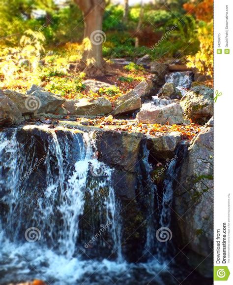 Miniature Effect Of Small Waterfall In Outdoor Park Stock Image Image