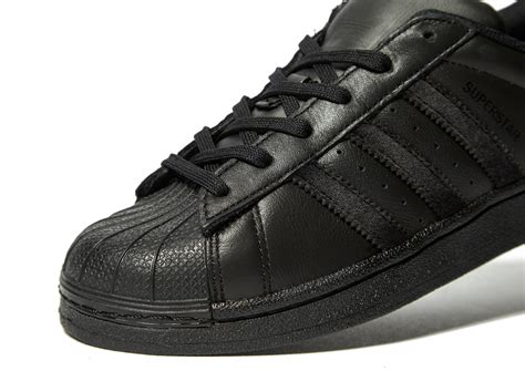 Stylized as adidas since 1949) is a german multinational corporation, founded and headquartered in herzogenaurach, germany, that designs and manufactures shoes, clothing and accessories. adidas Originals Superstar Velvet Junior in Black for Men - Lyst
