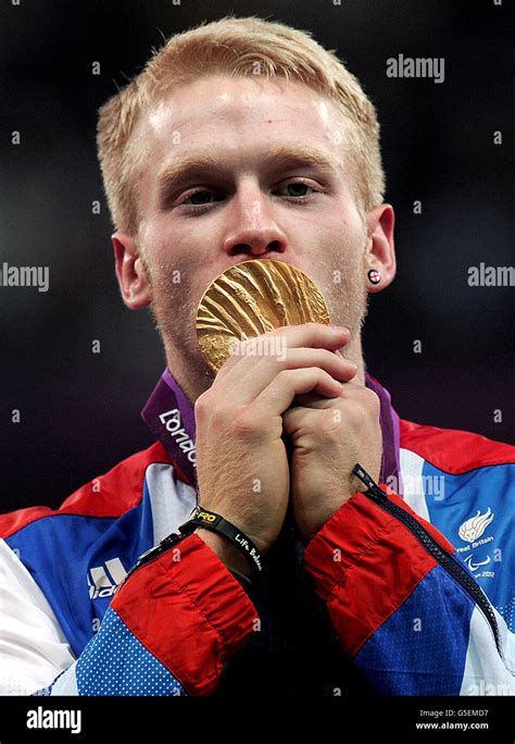 Great Britains Jonnie Peacock Celebrates With His Gold Medal After