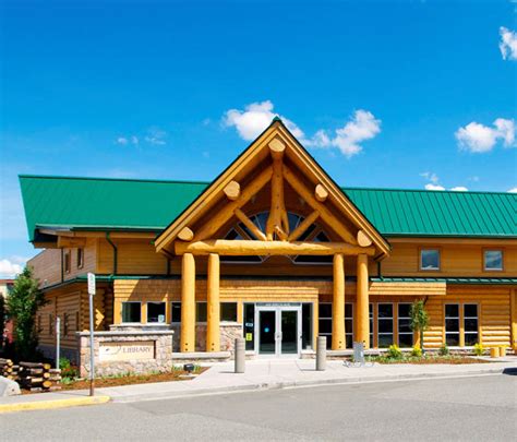 Handcrafted log home capital of north america. 100 Mile House Library | Mierau Contractors