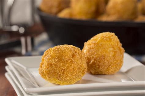 There is no better way to end a monday than with a cold beer, and a pile of deep fried, sweet corn studded nuggets of. Corn Souffle Hush Puppies | MrFood.com