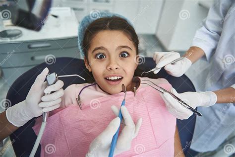 Scared Girl Is Afraid Of Dental Procedures Stock Photo Image Of