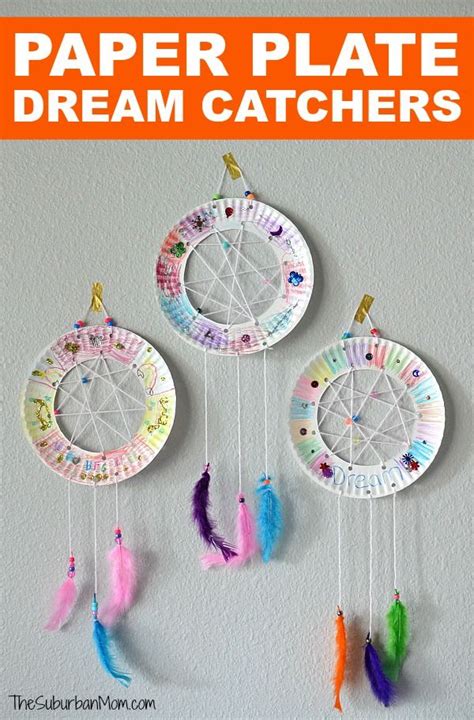 Paper Plate Dream Catchers With Colorful Feathers Hanging From The